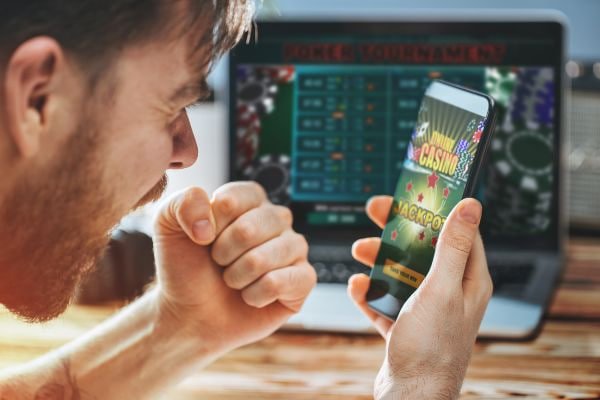 alexs mobile app interface showing live-dealer tables and sportsbook markets